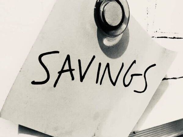 Post it note that states savings